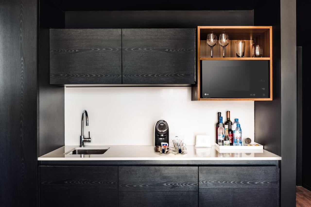 Отель Sls Buenos Aires Puerto Madero Экстерьер фото A wet bar in a hotel room