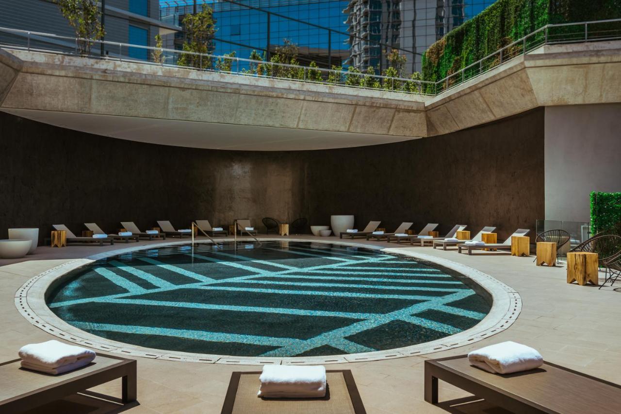 Отель Sls Buenos Aires Puerto Madero Экстерьер фото The pool at the hotel