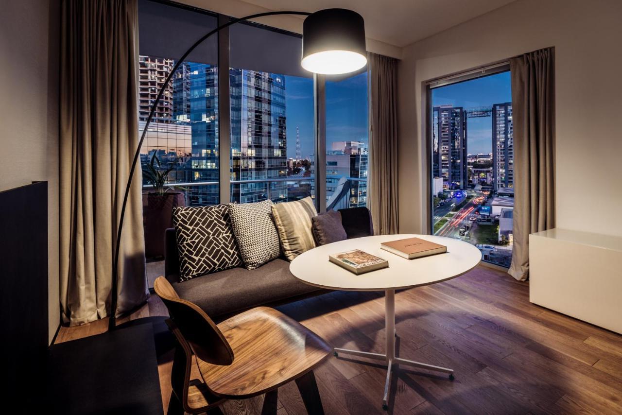 Отель Sls Buenos Aires Puerto Madero Экстерьер фото A living room at the hotel