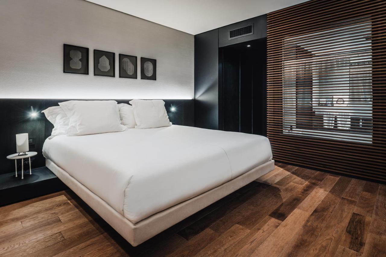 Отель Sls Buenos Aires Puerto Madero Экстерьер фото A bedroom at the hotel