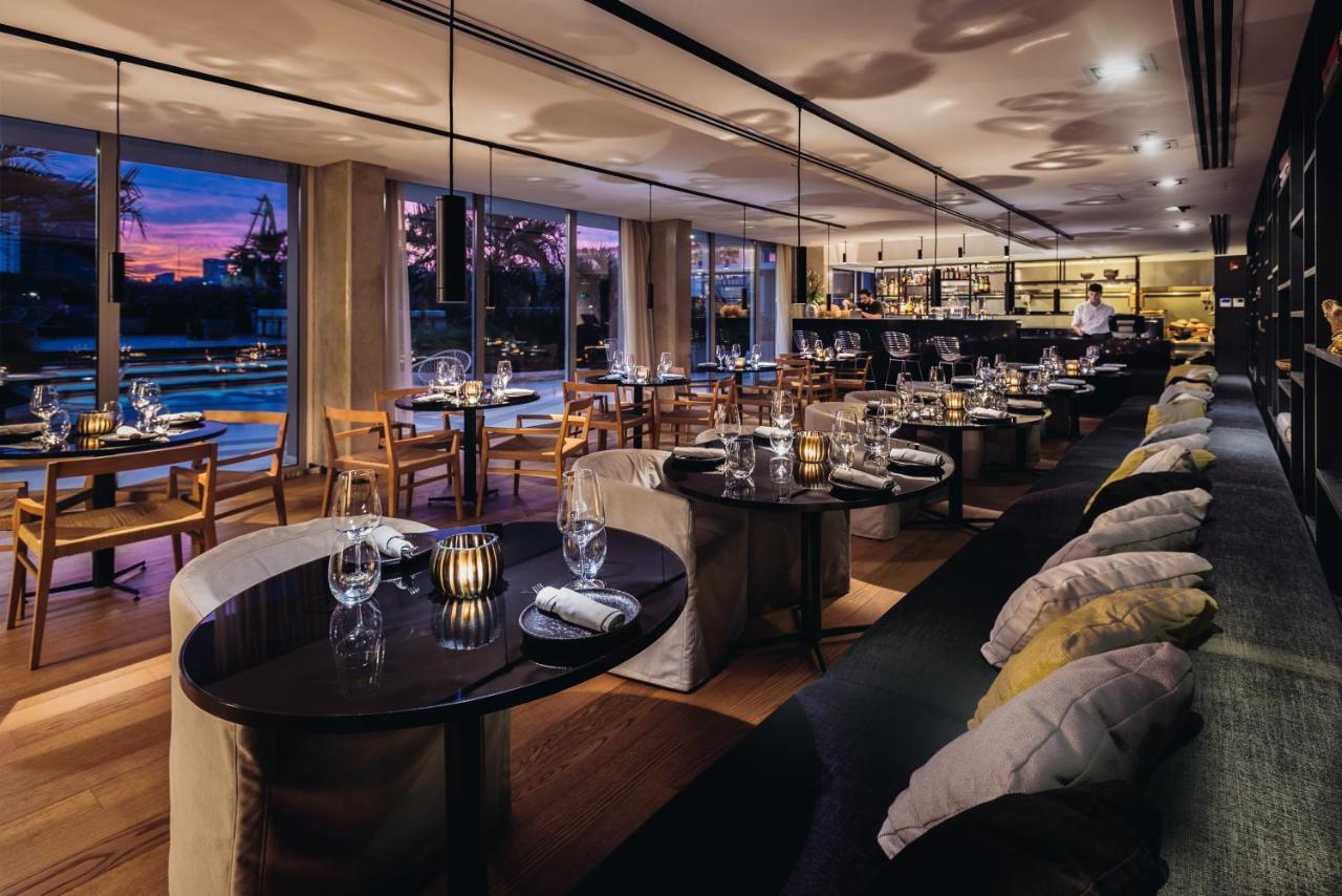 Отель Sls Buenos Aires Puerto Madero Экстерьер фото The River Café