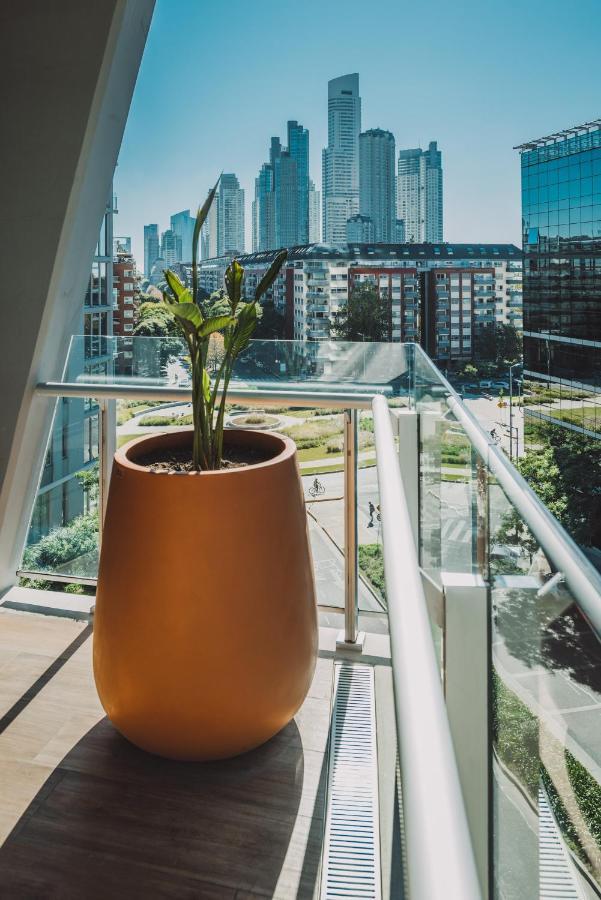Отель Sls Buenos Aires Puerto Madero Экстерьер фото A planter in a building