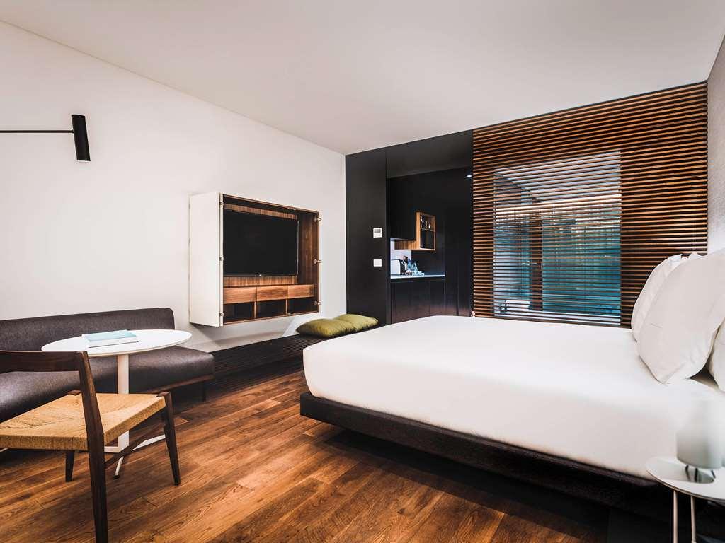 Отель Sls Buenos Aires Puerto Madero Номер фото A room at the hotel